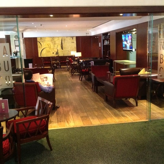 Photo taken at London Marriott Hotel Kensington by John C. on 4/23/2012