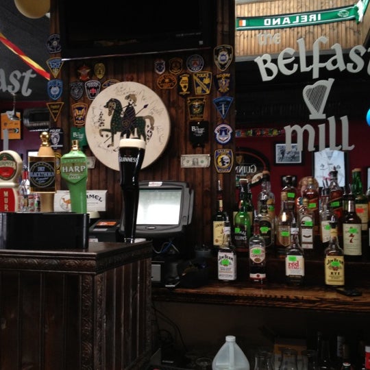 Photo taken at Belfast Mill Irish Pub by Christine W. on 6/30/2012