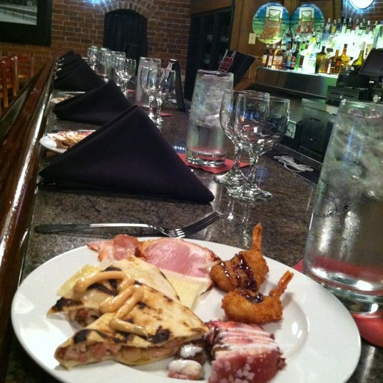 Photo taken at Chef Joseph&#39;s at The Connoisseur Room by Rebecca M. on 3/19/2012