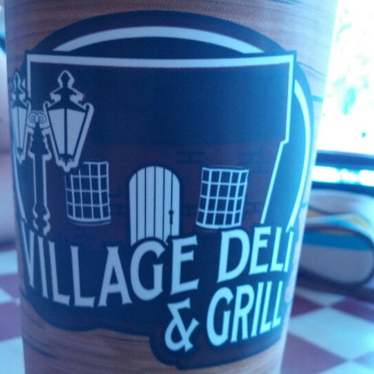 Photo taken at Village Deli &amp; Grill by William H. on 7/17/2012
