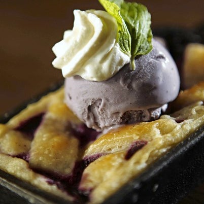 Try their blueberry pie: A lattice-crust top with a scoop of blueberry gelato (supplied by Black Dog Gelato) and a dab of Chantilly cream; beneath are 2 inches of piping-hot blueberry filling.