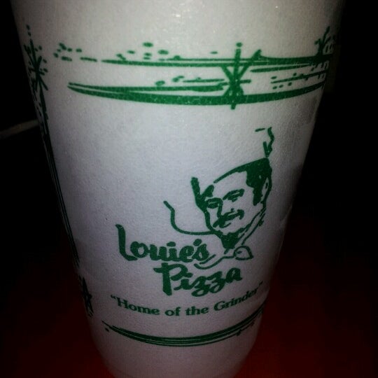 Photo taken at Louie&#39;s Pizza by Joseph O. on 8/18/2012