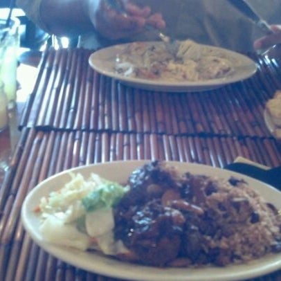 Photo taken at Chef Rob&#39;s Caribbean Cafe by Cheryl M. on 3/6/2012