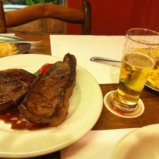 Photo taken at Santo Antônio Restaurante e Churrascaria by Alexandre F. on 3/18/2012