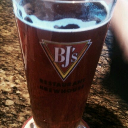 Photo taken at BJ&#39;s Restaurant &amp; Brewhouse by CJ B. on 7/27/2012