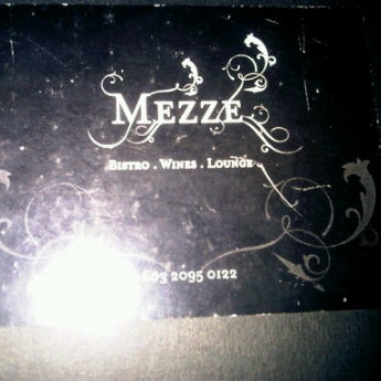 Foto diambil di Mezze Bar &amp; Bistro oleh Anoushka B. pada 2/24/2012