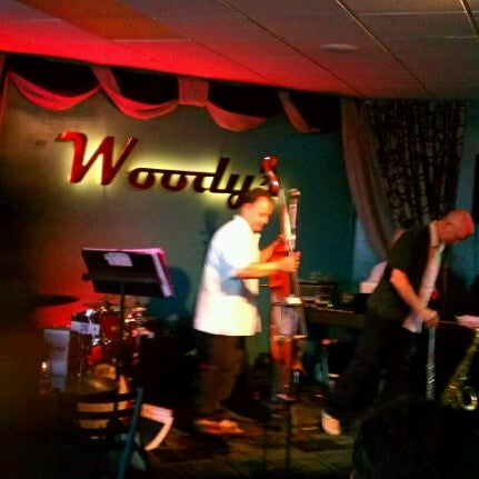 Photo taken at Woody&#39;s Burgers &amp; Beer by James G. on 5/18/2012