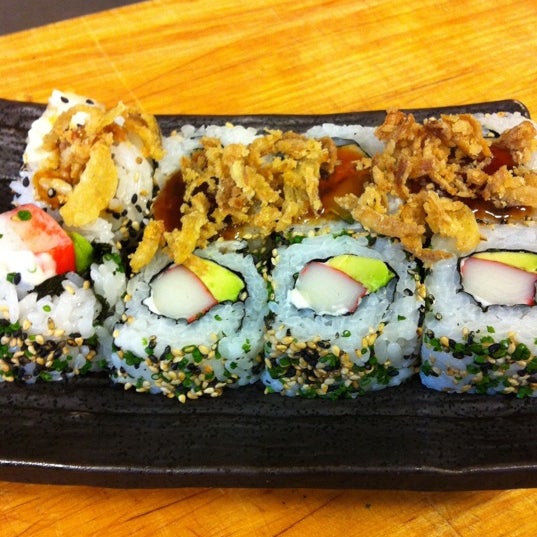 Photo taken at Sushi&#39;n&#39;Roll by Jessie D. on 4/12/2012