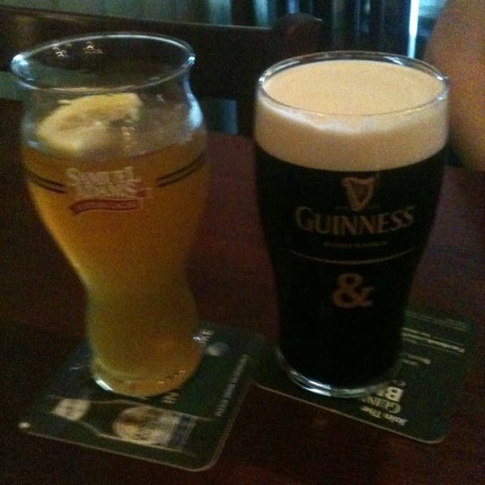 Photo taken at Dubh Linn Square Irish Pub by Siobhan G. on 4/20/2012