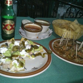 Photo taken at Javier&#39;s Gourmet Mexicano by Mandy A. on 4/25/2012