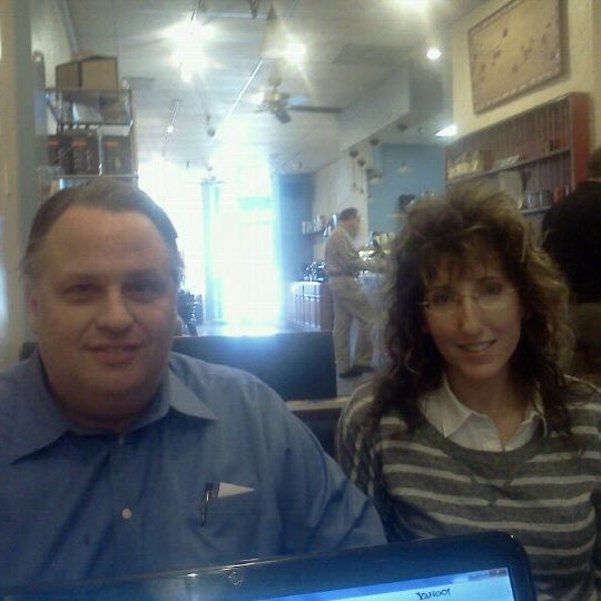 Photo taken at New World Coffee House by Whitney H. on 4/11/2012
