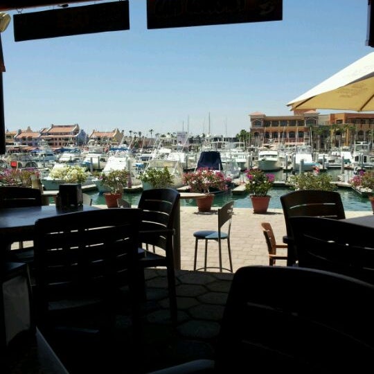Foto tomada en Mango Cantina Restaurant &amp; Sports Bar  por Mark B. el 5/11/2012