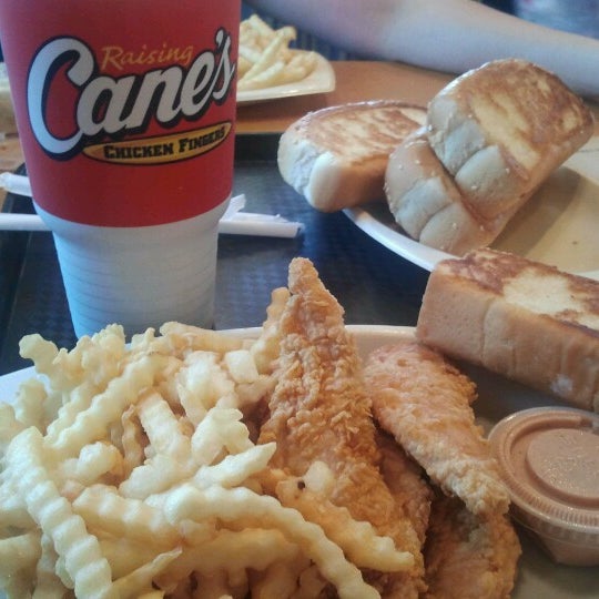 Photo taken at Raising Cane&#39;s Chicken Fingers by Sergio G. on 6/24/2012