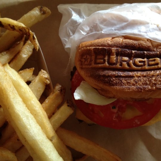 Photo taken at BurgerFi by Jessica T. on 5/23/2012