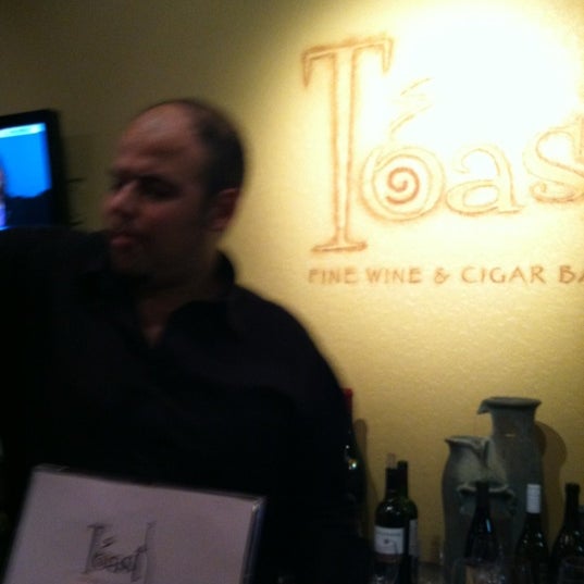 Photo taken at TOAST Wine and Cafe by Cathy E. on 5/26/2012