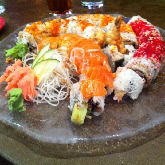 Photo taken at Sushi Blues Cafe by Elisha Gutloff, M. on 3/30/2012