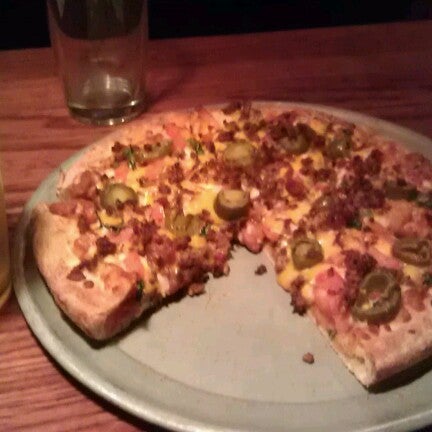 Photo taken at Glass Nickel Pizza Co. - Madison East by Dougie C. on 7/10/2012