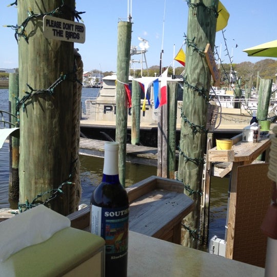 Photo taken at Yacht Basin Eatery by Ginger R. on 3/26/2012