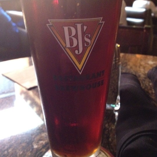 Photo taken at BJ&#39;s Restaurant &amp; Brewhouse by Brittany H. on 6/4/2012