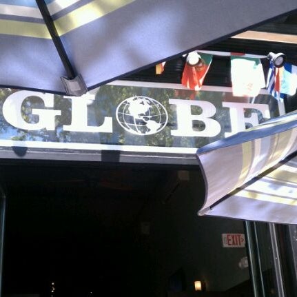 Photo taken at Globe Bar &amp; Cafe by Taylor C. on 6/15/2012