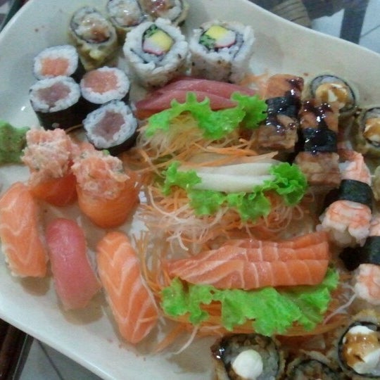 Photo taken at Kyuden Sushi by Luciano Dias on 6/16/2012