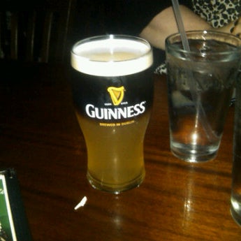 Photo taken at Sláinte Pub &amp; Grill by Melissa C. on 3/16/2012