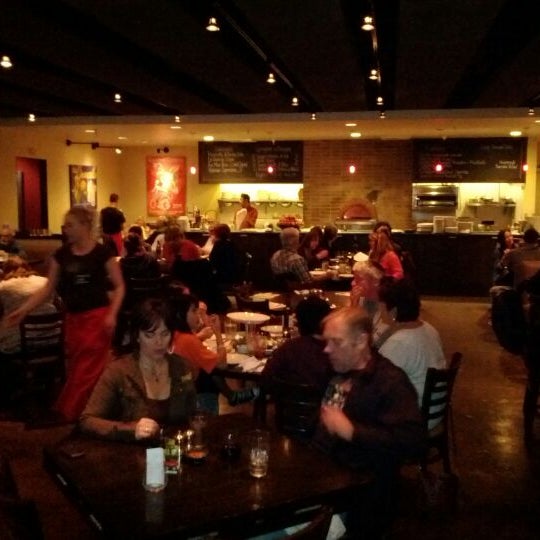 Photo taken at Rosso Pizzeria and Wine Bar by Cam J. on 4/15/2012
