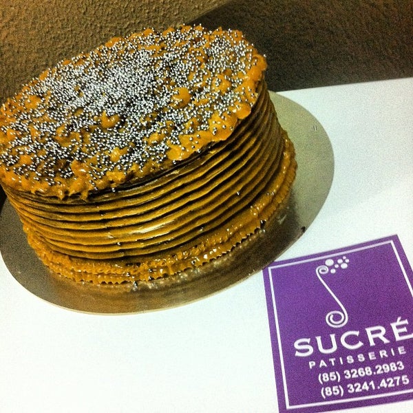 Photo taken at Sucré Patisserie by Ita T. on 5/30/2012