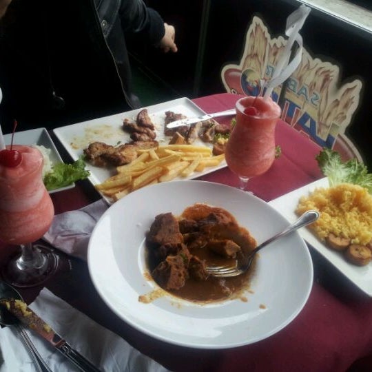 Photo taken at Sabor Latino Restaurant by Erica O. on 3/21/2012