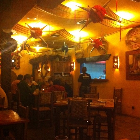 Photo taken at Totopos Gastronomia Mexicana by Cassia M. on 3/31/2012