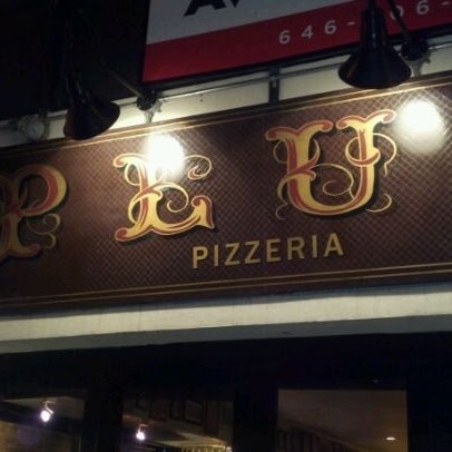 Photo taken at Plum Pizzeria &amp; Bar by Robert J. on 2/15/2012
