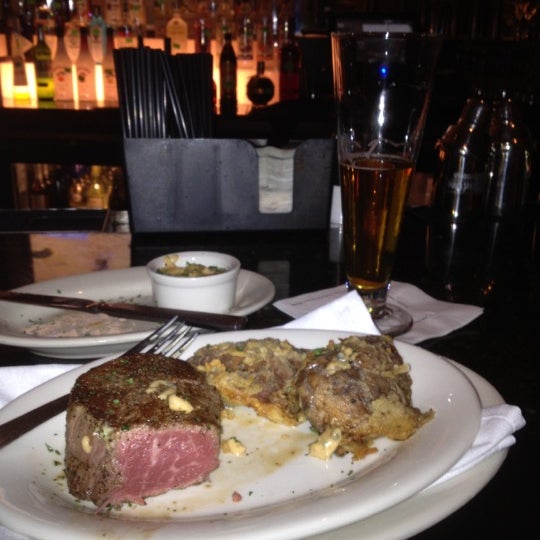 Photo taken at Ruth&#39;s Chris Steak House - Wilmington, NC by Brian D. on 3/14/2012
