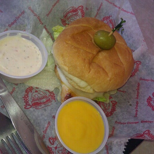 Photo taken at Cheeburger Cheeburger by Jeannine F. on 6/15/2012