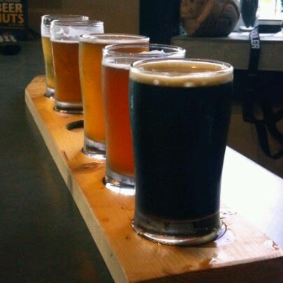 Photo taken at Paw Paw Brewing Company by Ryan B. on 7/26/2012