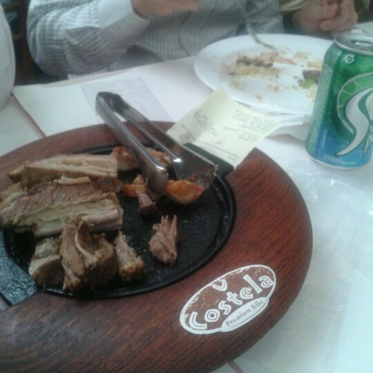 Photo taken at Costela Premium Ribs by Claudině J. on 9/11/2012