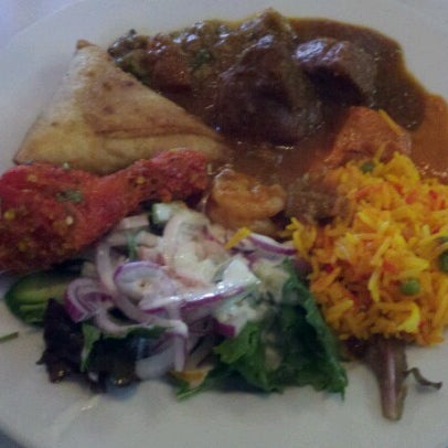 Photo taken at India&#39;s Tandoori Halal Restaurant by Jennifer N. on 6/27/2012