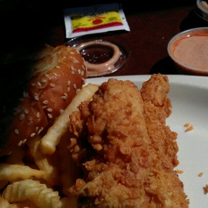 Photo taken at Raising Cane&#39;s Chicken Fingers by Brenda A. on 6/14/2012