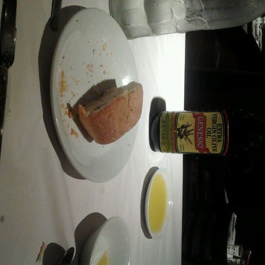 Photo taken at Romano&#39;s Macaroni Grill by Annis B. on 4/20/2012