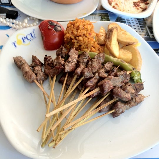 Photo taken at Topçu Restaurant by Ertug O. on 7/29/2012
