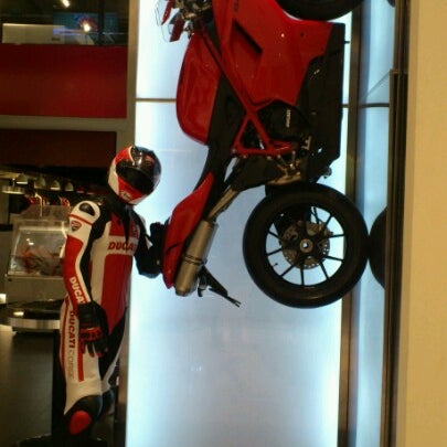 Photo taken at Ducati Caffe by Eva on 7/14/2012