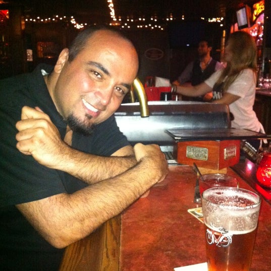 Photo taken at Pineapple Hill Saloon &amp; Grill by Gaelle N. on 5/20/2012