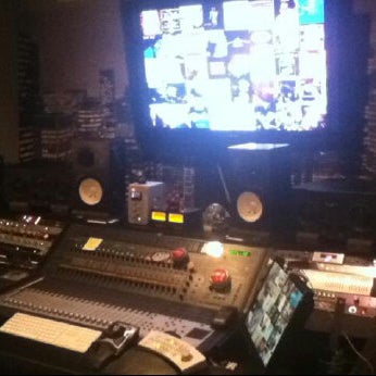 Photo taken at Stadiumred Studios by Jonathan C. on 4/10/2012