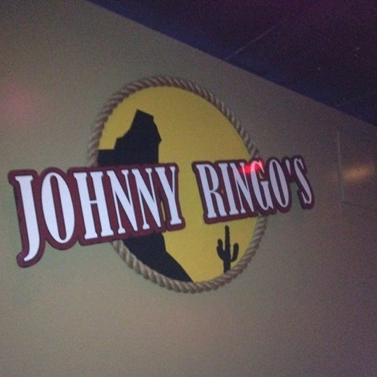 Photo taken at Johnny Ringo&#39;s by The Family Tree C. on 8/27/2012