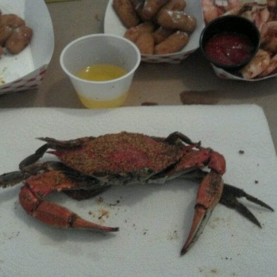 Photo taken at Blue Crab by Nicole I. on 7/3/2012