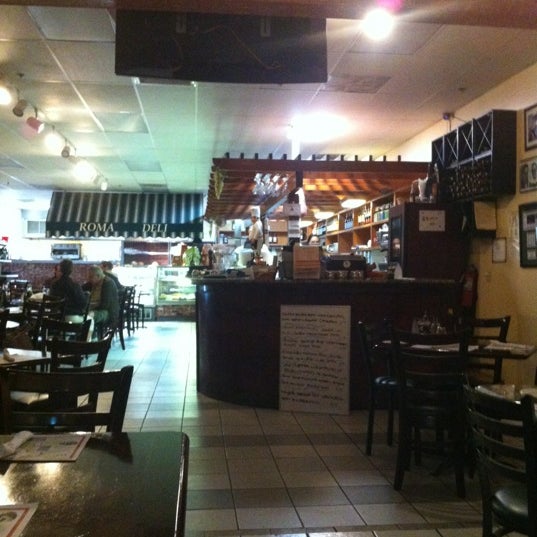 Photo taken at Roma Deli &amp; Restaurant by Lyndsey B. on 4/4/2012