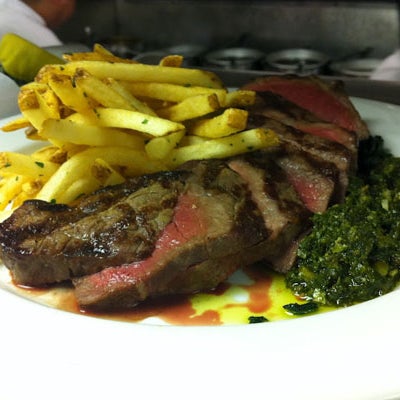 TAGLIATA DI MANZOGrilled & sliced dry aged beef NY steak, shoestring patatine fries, salsa verde alla Milanese