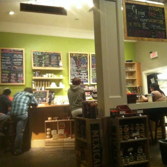Photo taken at Cure Coffeehouse and Brasserie by Jeff C. on 2/21/2012