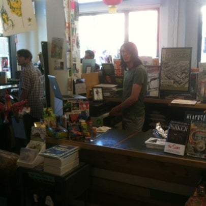 Photo taken at Floating World Comics by Shannon S. on 7/28/2012