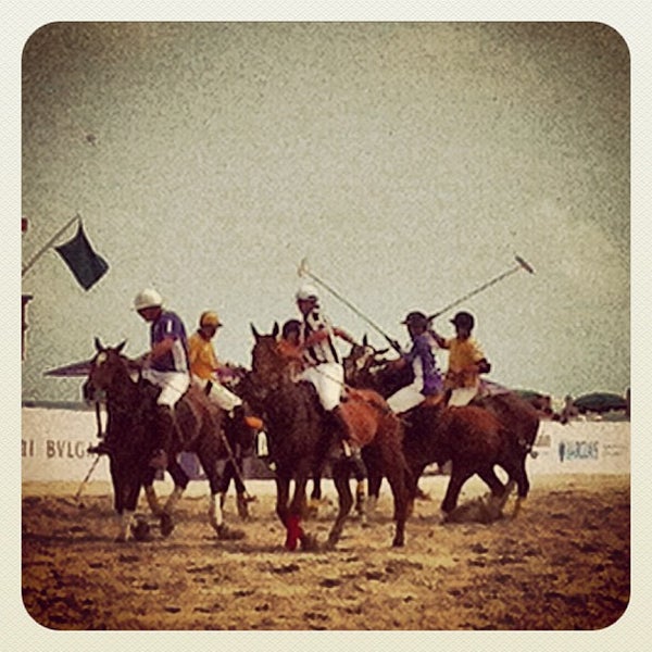 Photo taken at Miami Beach Polo World Cup by Jonathan B. on 4/27/2012