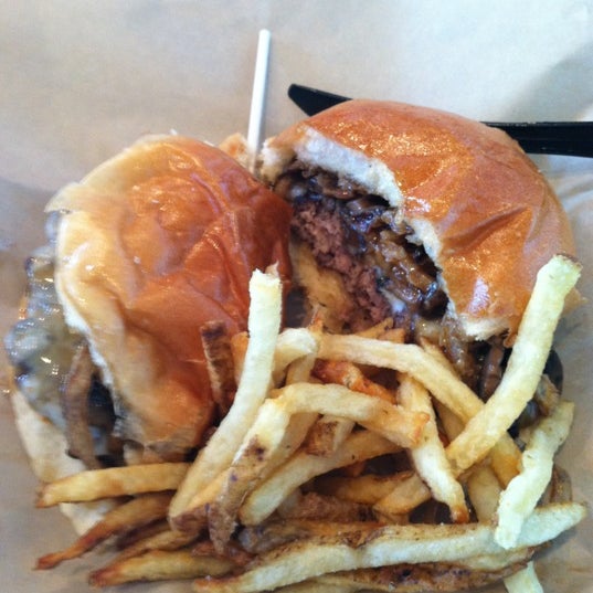 Photo taken at Juicy Burgers &amp; Dogs by Andrew S. on 6/22/2012